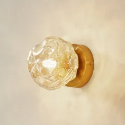 Lindby wandlamp Piatra, barnsteen/messing, glas, Ø 16 cm, G9