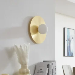 Lindby wandlamp Zain, goud/wit, glas, Ø 33 cm, G9