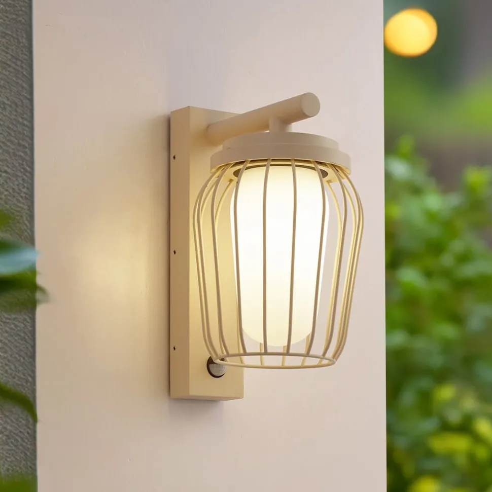 Lucande buitenwandlamp Chandan, 30cm, beige, sensor, IP44