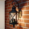 Lucande buitenwandlamp Marcellino, roest, metaal, glas