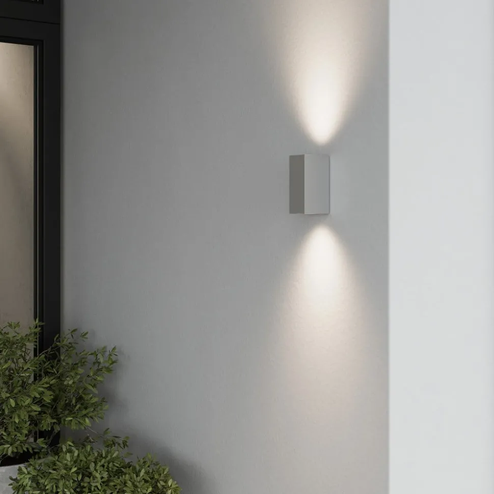 Lucande buitenwandlamp Tavi, 15 cm, zilver, Bridgelux LED