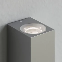 Lucande buitenwandlamp Tavi, 15 cm, zilver, Bridgelux LED