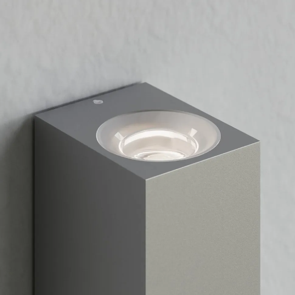 Lucande buitenwandlamp Tavi, 15 cm, zilver, Bridgelux LED