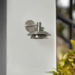 Lucande buitenwandlamp Thais, roestvrij staal, Ø 25 cm