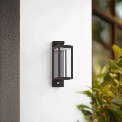 Lucande LED buiten wandlamp Ferdinand, roest, sensor, IP54