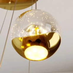 Lucande LED hanglamp Hayley, Ø 40 cm, 9-lamps, goud, glas