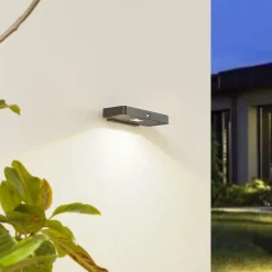 Lucande LED wandlamp Tavon, hoekig, zwart, sensor