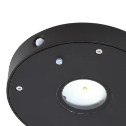Lucande LED wandlamp Tavon, rond, zwart, sensor