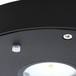 Lucande LED wandlamp Tavon, rond, zwart, sensor