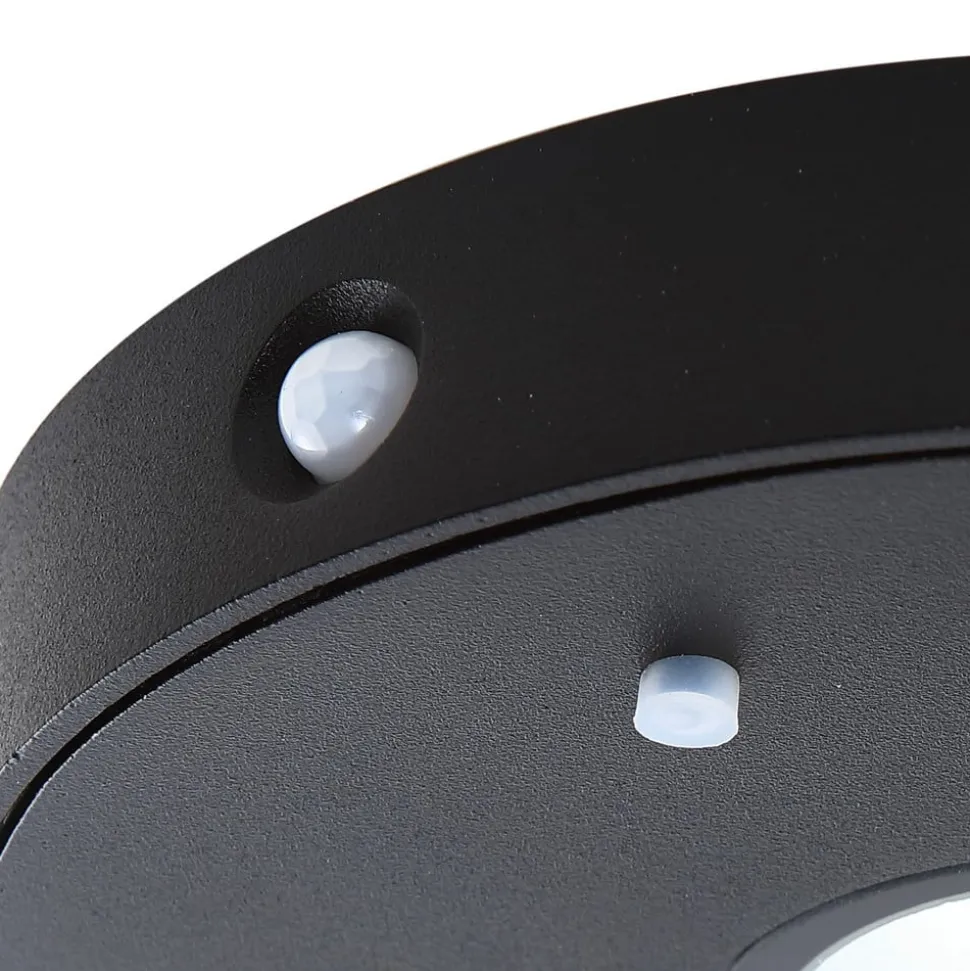 Lucande LED wandlamp Tavon, rond, zwart, sensor