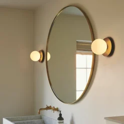 Nuura Liila 1 Medium wandlamp, 1-lamp goud/wit