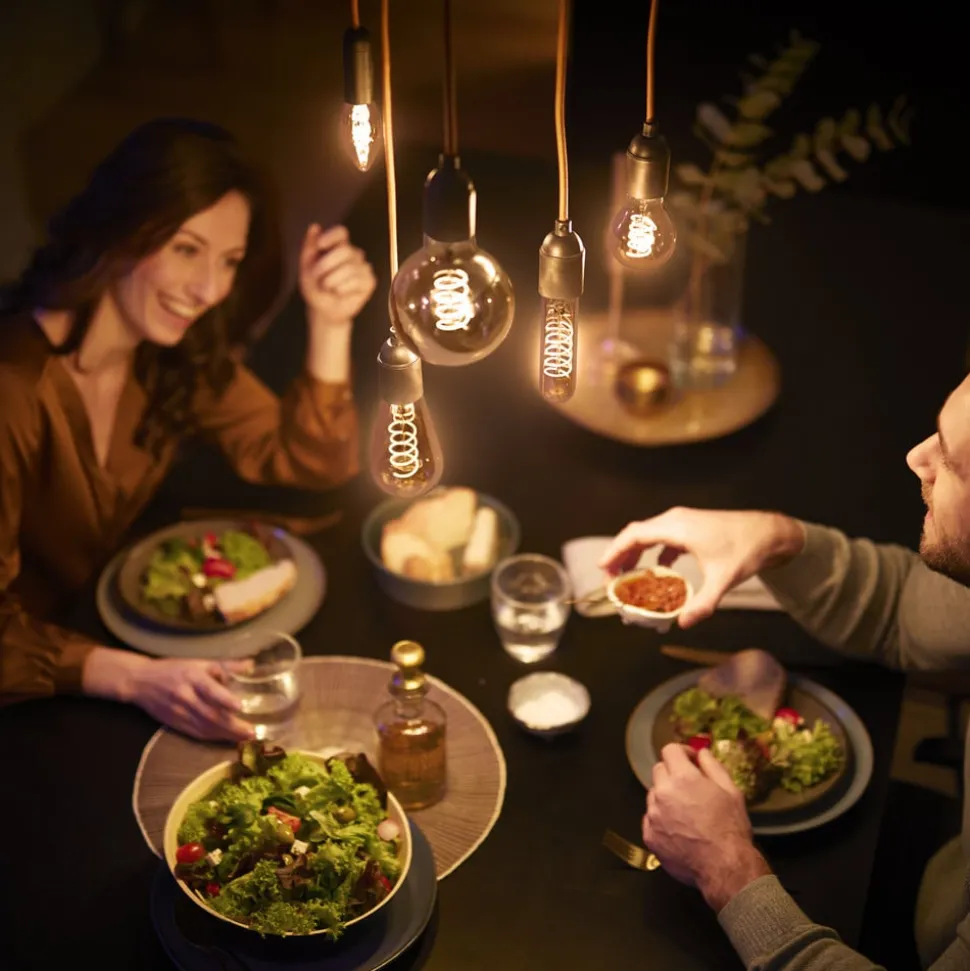 Philips E27 LED lamp G45 3W dimbaar 2.200K goud