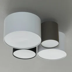 Plafondlamp Hotel met vier textiel lampenkappen