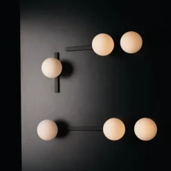 Pluto wandlamp, 2-lamps, zwart/wit, schakelaar