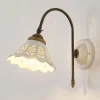 Portico - wandlamp met gebogen arm