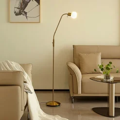 Vloerlamp Lindby Elaina, messingkleurig, 162cm, flexibel, E14