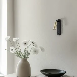 Wandlamp Enzo Long, zwart-goud, 22 cm, verstelbaar, G9