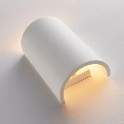 Wandlamp Lindby Colja, rond, hoogte 16 cm, gips, wit