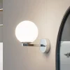 Wandlamp Lucande Bidolo, chroomkleurig, glas, Ø 12 cm, IP44