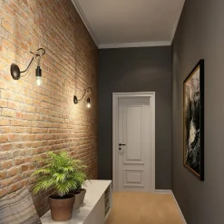 Wandlamp Lucande Ropina, zwart, henneptouw, hoogte 25cm