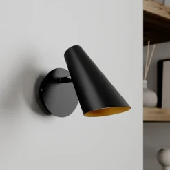 Wandlamp Lucande Wibke, hoogte 24 cm, zwart, goud, metaal