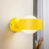 Wandlamp Mado van staal, geel, 1-lamp