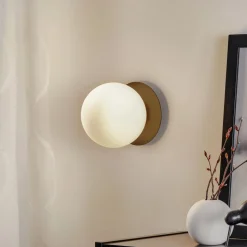 Wandlamp Minerva K1 met zwarte metalen rand