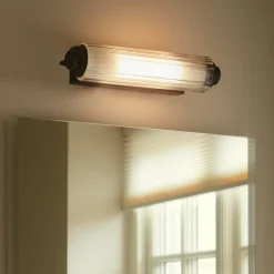 Wandlamp Nimal Double, IP44, kunststof, metaal. zwart